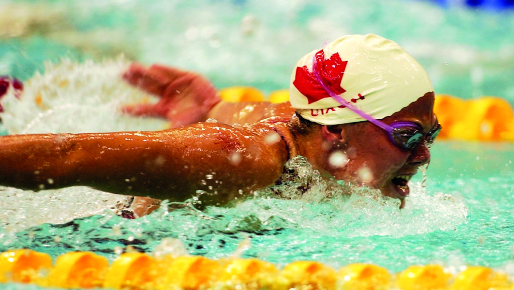 Picture of Stephanie Dixon swimming for Canada in the paralympics.